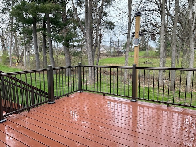 wooden deck with a yard