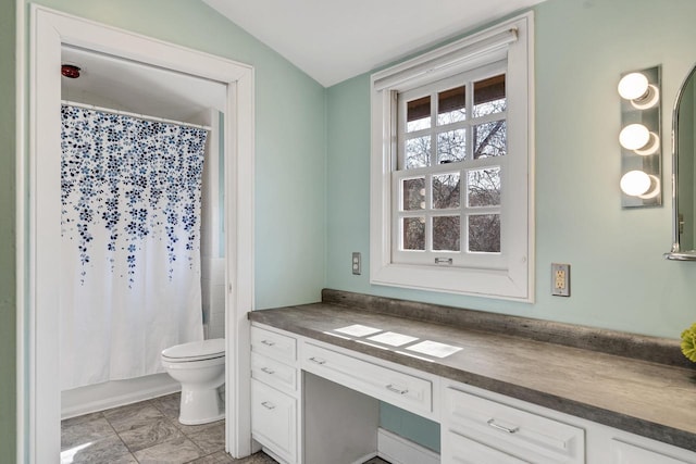 full bath with lofted ceiling, toilet, and vanity