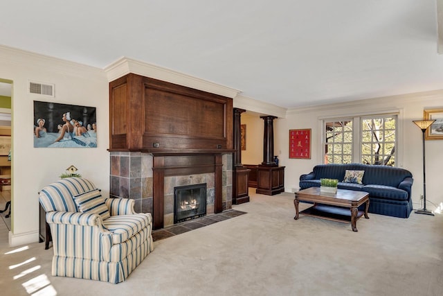 living room featuring crown molding, light carpet, and visible vents