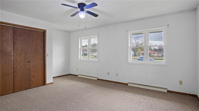 1413 E Clairemont Ave, Eau Claire, WI 54701 - unfurnished bedroom with carpet flooring, baseboards, and baseboard heating