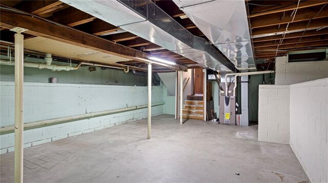 1413 E Clairemont Ave, Eau Claire, WI 54701 - unfinished basement with stairway and heating unit