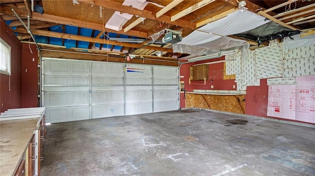 1413 E Clairemont Ave, Eau Claire, WI 54701 - garage featuring a garage door opener