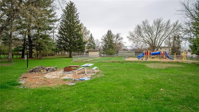 1413 E Clairemont Ave, Eau Claire, WI 54701 - view of yard with a playground and fence