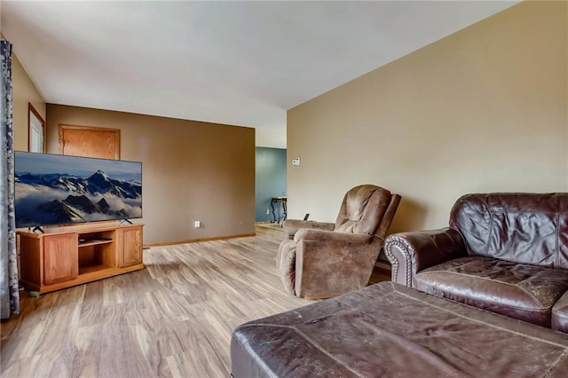 E5081 865th St, Boyceville, WI 54725 - living area featuring light wood finished floors and baseboards