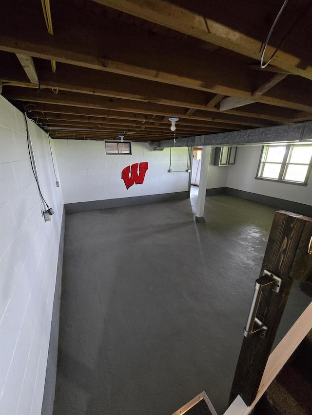 garage featuring concrete block wall