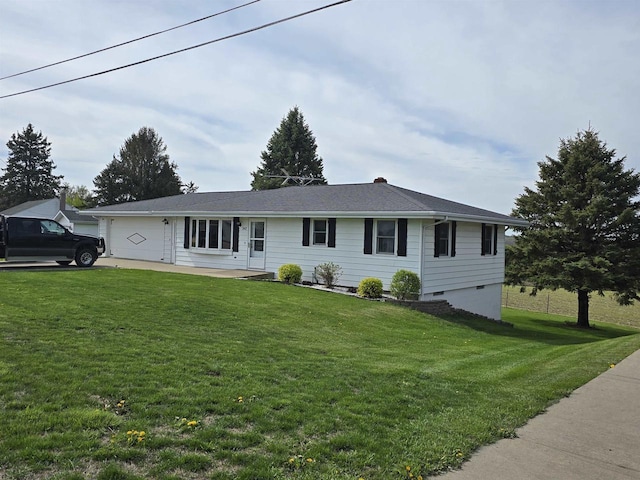 single story home featuring a garage and a front lawn