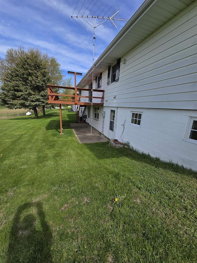 view of yard with a deck