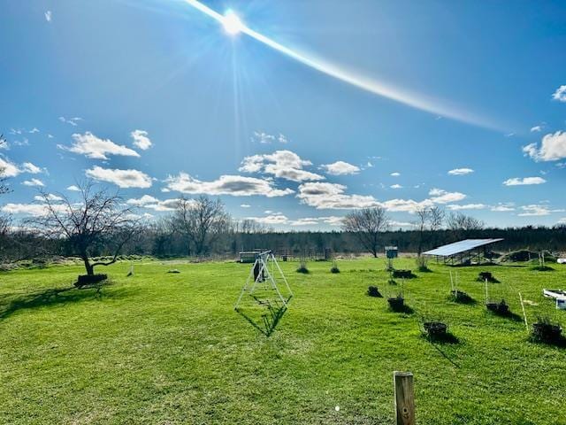 surrounding community featuring a rural view