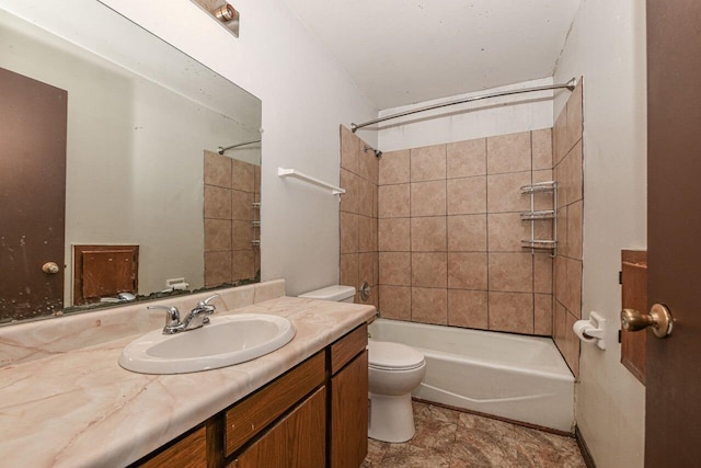 bathroom featuring vanity, toilet, and bathing tub / shower combination