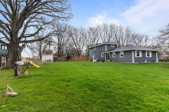 view of yard featuring fence