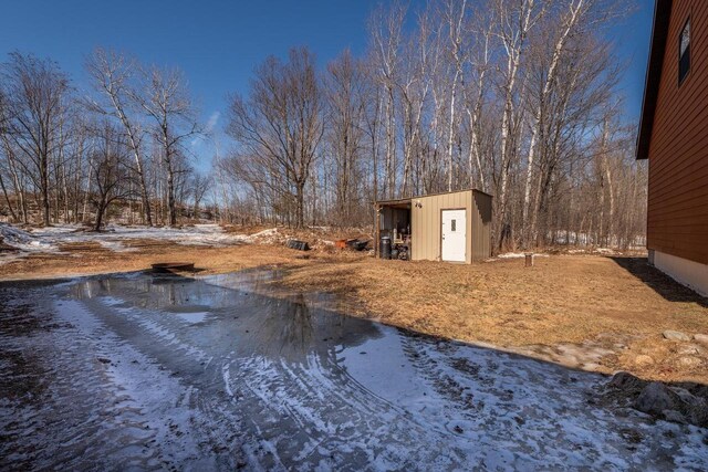 9327 Strong Rd, Argonne, WI 54511 - view of yard with a storage shed and an outbuilding
