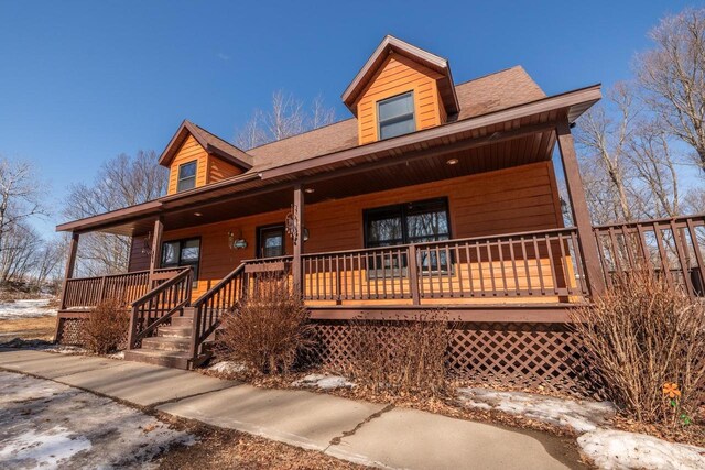 9327 Strong Rd, Argonne, WI 54511 - view of front of home featuring a porch and roof with shingles