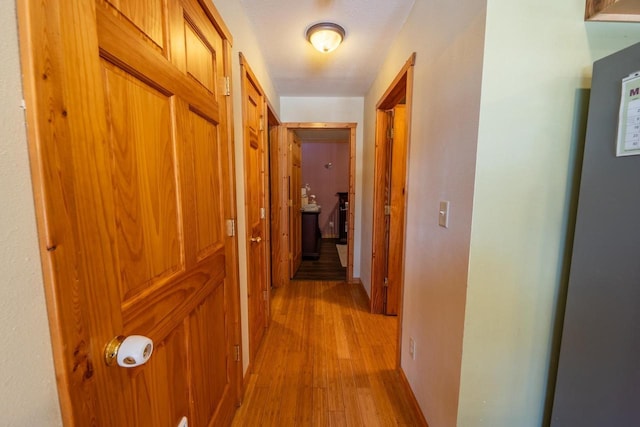 9327 Strong Rd, Argonne, WI 54511 - hallway featuring light wood finished floors