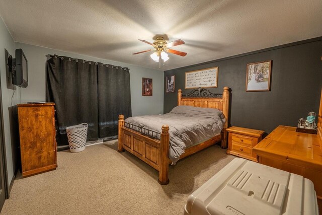 9327 Strong Rd, Argonne, WI 54511 - bedroom with light colored carpet, a textured ceiling, and ceiling fan