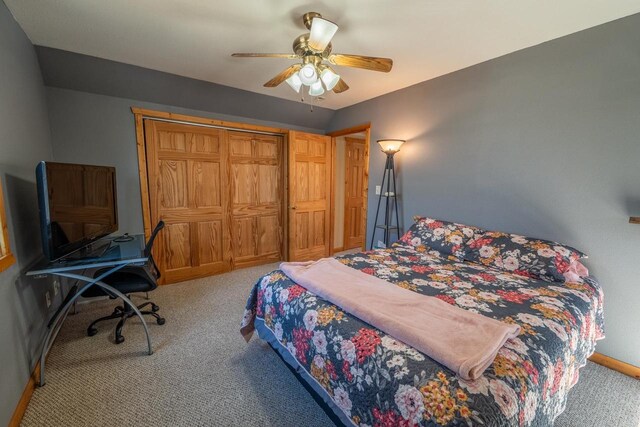 9327 Strong Rd, Argonne, WI 54511 - bedroom featuring carpet flooring, a closet, baseboards, and ceiling fan