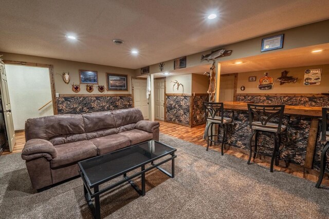 9327 Strong Rd, Argonne, WI 54511 - living room featuring recessed lighting, bar area, and wood finished floors