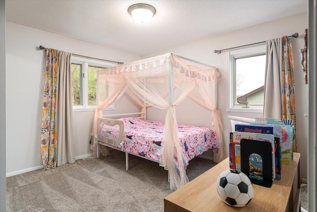 1218 Red Cedar Ct, Onalaska, WI 54650 - bedroom featuring baseboards and carpet flooring