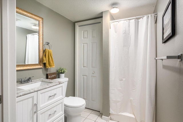 1218 Red Cedar Ct, Onalaska, WI 54650 - bathroom with a shower with curtain, a textured ceiling, toilet, tile patterned floors, and vanity