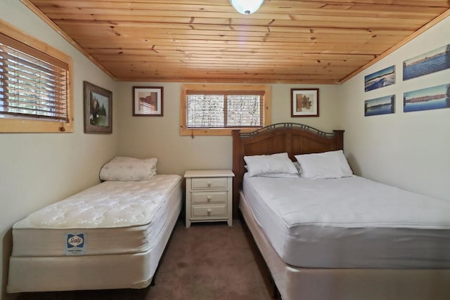 7589 Nose Lake Rd, Rhinelander, WI 54501 - carpeted bedroom with wooden ceiling