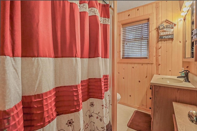 7589 Nose Lake Rd, Rhinelander, WI 54501 - full bathroom featuring toilet, wood walls, vanity, and curtained shower