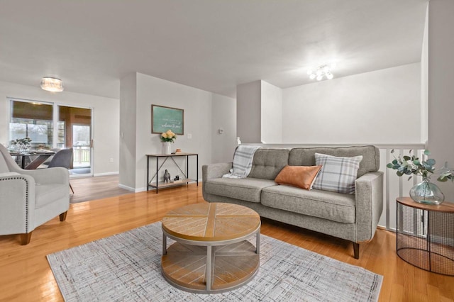 living area with wood finished floors