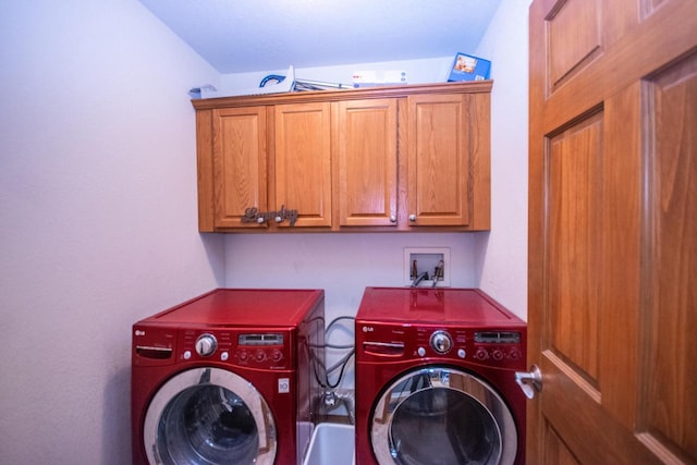 2704 Kettle Ct, West Bend, WI 53090 - laundry area with separate washer and dryer and cabinet space