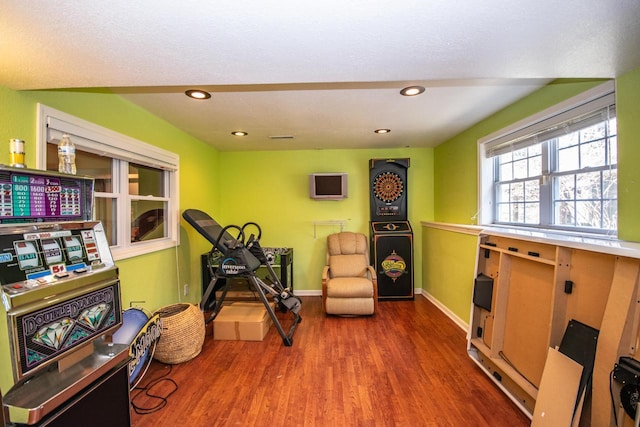 2704 Kettle Ct, West Bend, WI 53090 - workout room featuring wood finished floors, baseboards, and recessed lighting