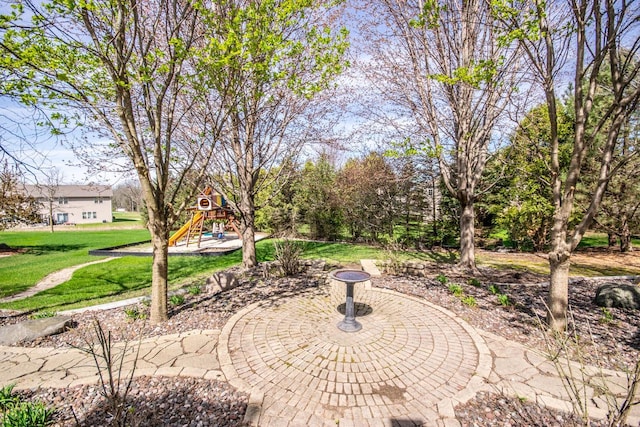 2704 Kettle Ct, West Bend, WI 53090 - view of patio with playground community