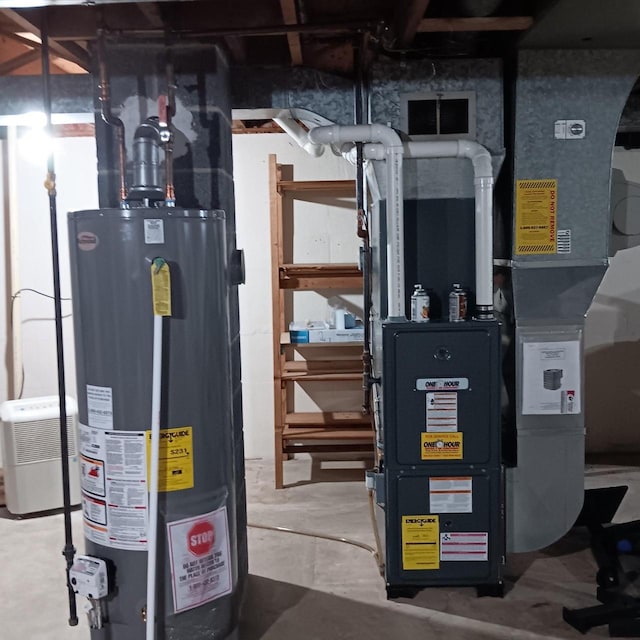 utilities featuring heating unit and gas water heater