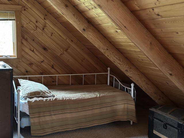 carpeted bedroom featuring wooden ceiling