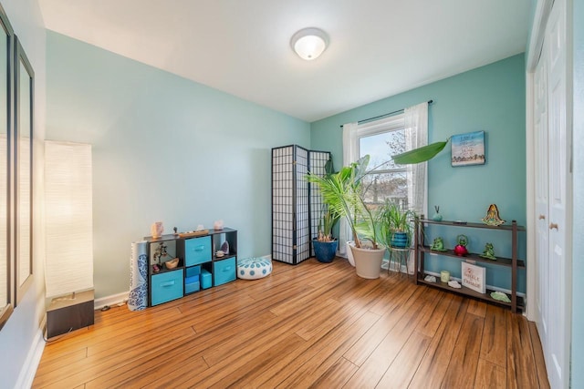 recreation room with wood finished floors