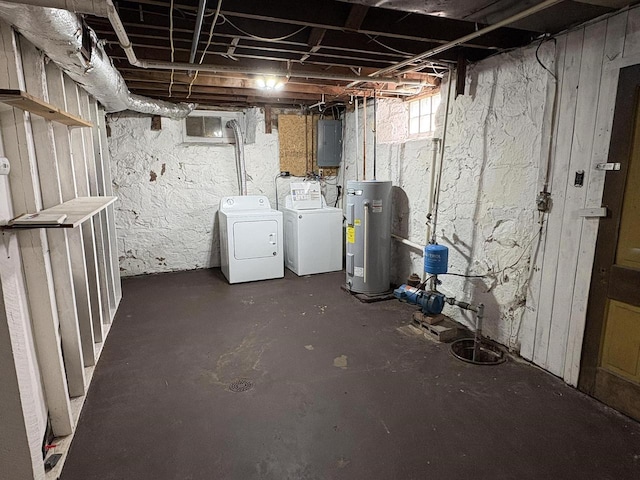 basement with separate washer and dryer, water heater, and electric panel