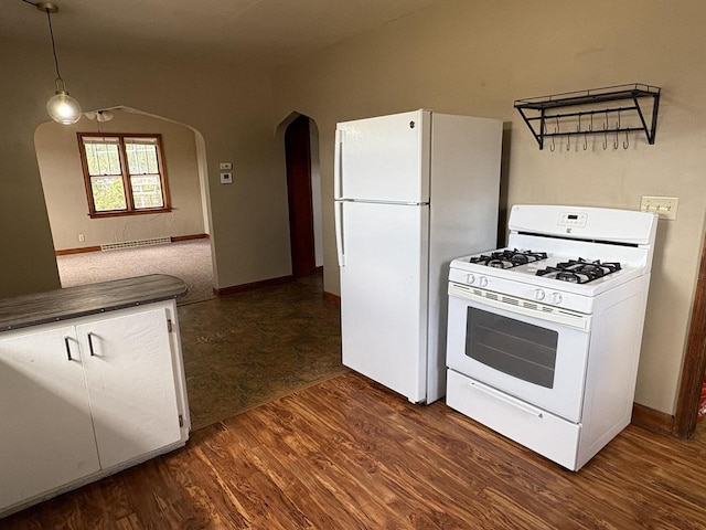 kitchen featuring a baseboard radiator, white appliances, dark wood-type flooring, arched walkways, and dark countertops