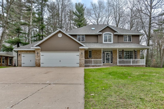 4109 Oak Ter, Weston, WI 54476 - traditional home with covered porch, an attached garage, brick siding, driveway, and a front lawn
