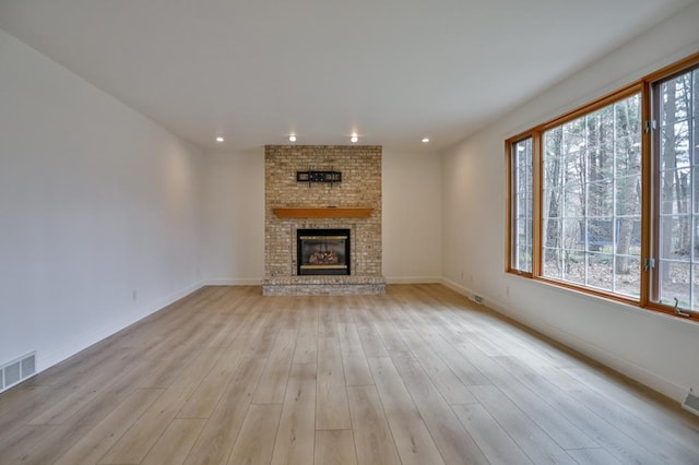 4109 Oak Ter, Weston, WI 54476 - unfurnished living room featuring baseboards, light wood-style flooring, and visible vents