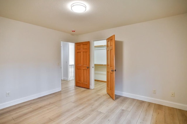 4109 Oak Ter, Weston, WI 54476 - unfurnished room featuring baseboards and light wood finished floors