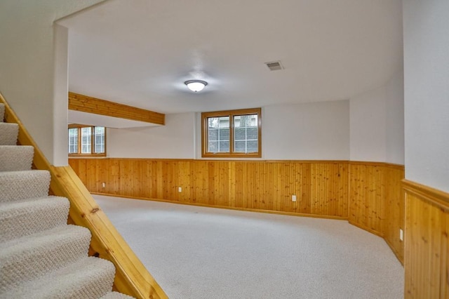 4109 Oak Ter, Weston, WI 54476 - stairs featuring wooden walls, carpet floors, a wainscoted wall, and visible vents
