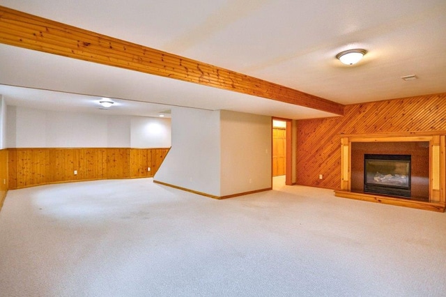 4109 Oak Ter, Weston, WI 54476 - finished basement with wooden walls, carpet flooring, baseboards, and a glass covered fireplace