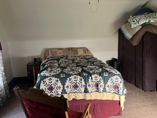 carpeted bedroom with baseboards