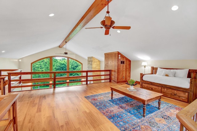 bedroom featuring lofted ceiling with beams, recessed lighting, and light wood-style floors