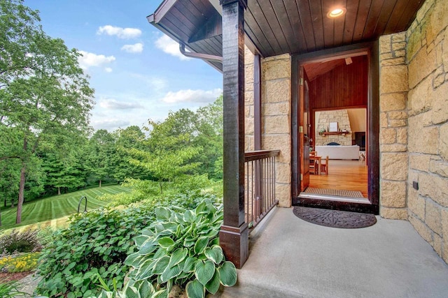 property entrance featuring stone siding