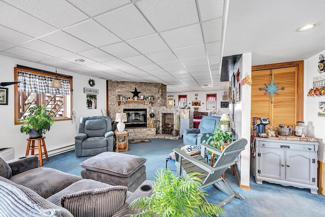 3280 County Rd S, Little Suamico, WI 54141 - living area with a fireplace, carpet, and a paneled ceiling