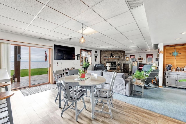 3280 County Rd S, Little Suamico, WI 54141 - dining area with light wood finished floors, visible vents, and a drop ceiling