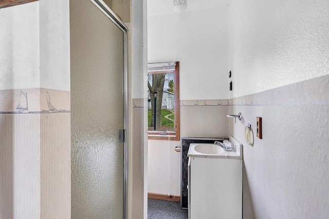 3280 County Rd S, Little Suamico, WI 54141 - laundry room featuring a sink and a textured wall