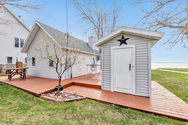 3280 County Rd S, Little Suamico, WI 54141 - exterior space featuring a lawn, a deck, an outbuilding, and a storage unit