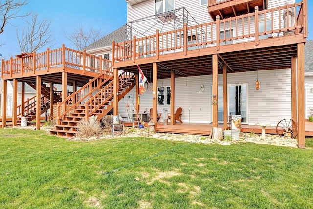 3280 County Rd S, Little Suamico, WI 54141 - rear view of house with a lawn, stairway, a wooden deck, and a shingled roof