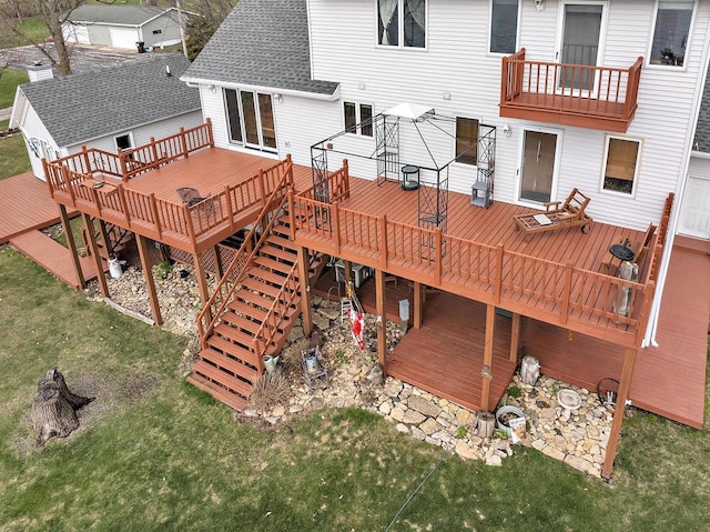 3280 County Rd S, Little Suamico, WI 54141 - rear view of property with a shingled roof, a yard, and a wooden deck