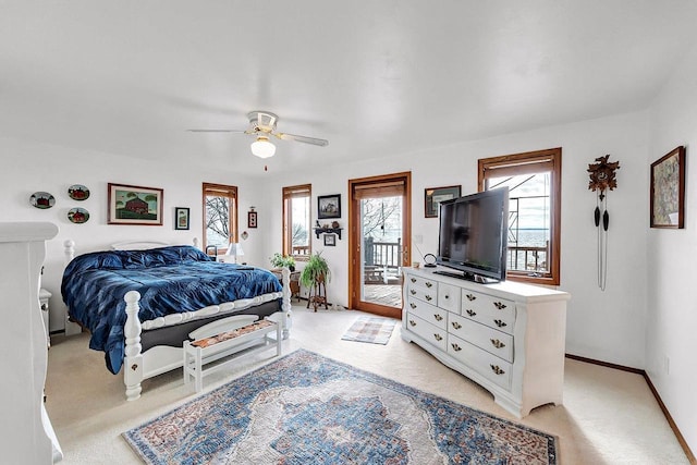 3280 County Rd S, Little Suamico, WI 54141 - bedroom with light carpet, access to outside, baseboards, and a ceiling fan