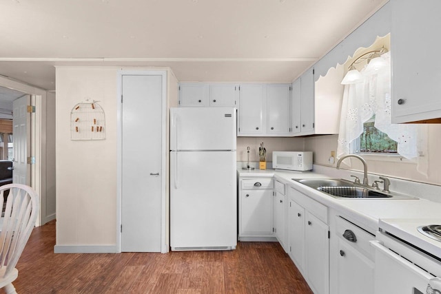 kitchen featuring wood finished floors, a sink, white cabinetry, white appliances, and light countertops