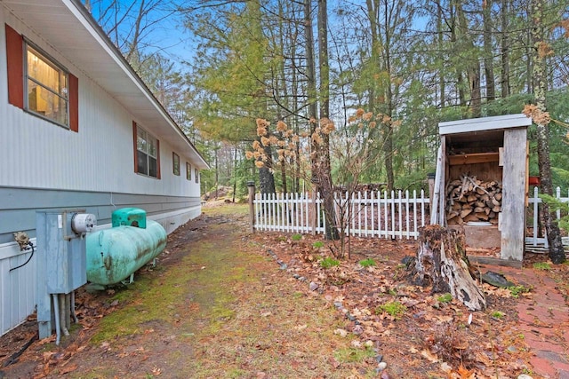 view of home's exterior featuring fence